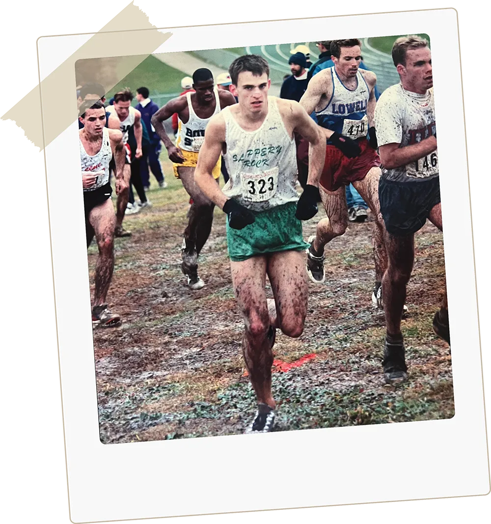 Eric McBride running during a cross country meet in the mid-1990s