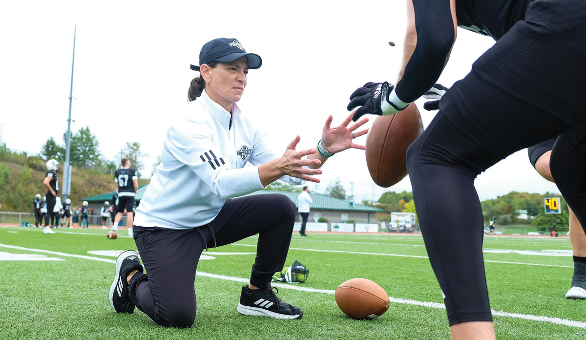 Lisa Horton running a drill for the Slippery Rock football team