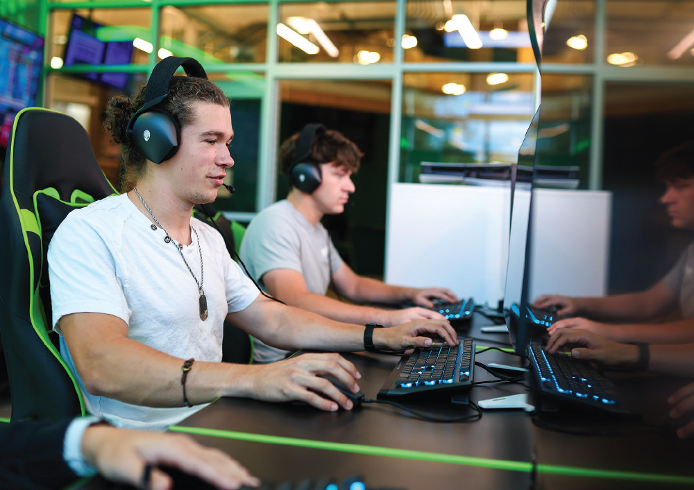 members of the Esports Club competing against teams from other colleges