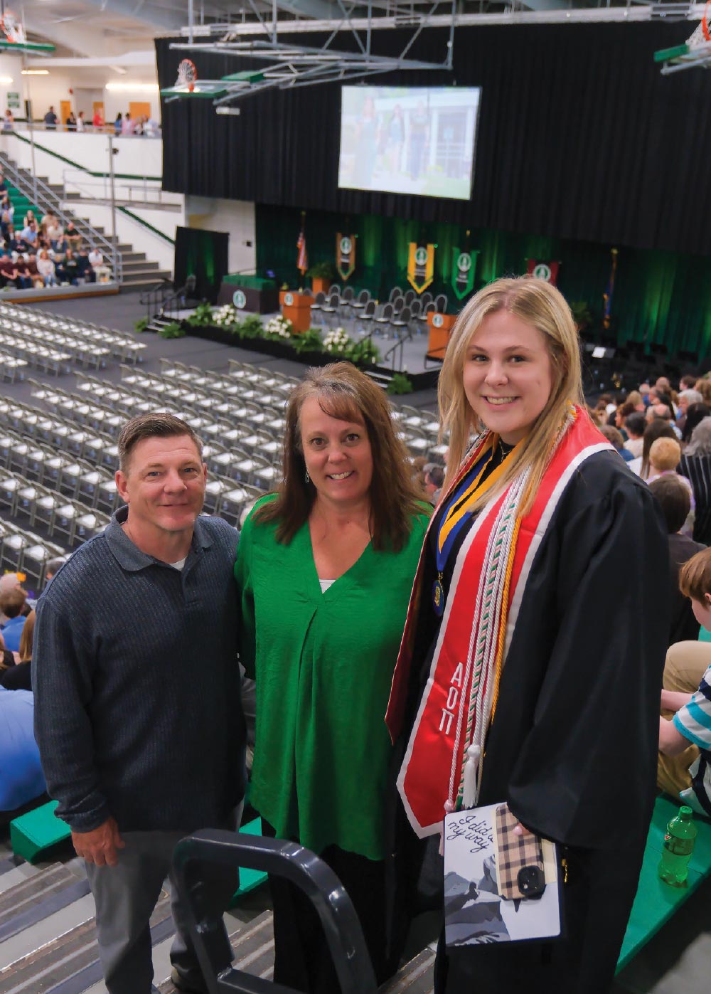 Michael and Amanda Habursky with their daughter Mikayla before SRU’s commencement ceremony