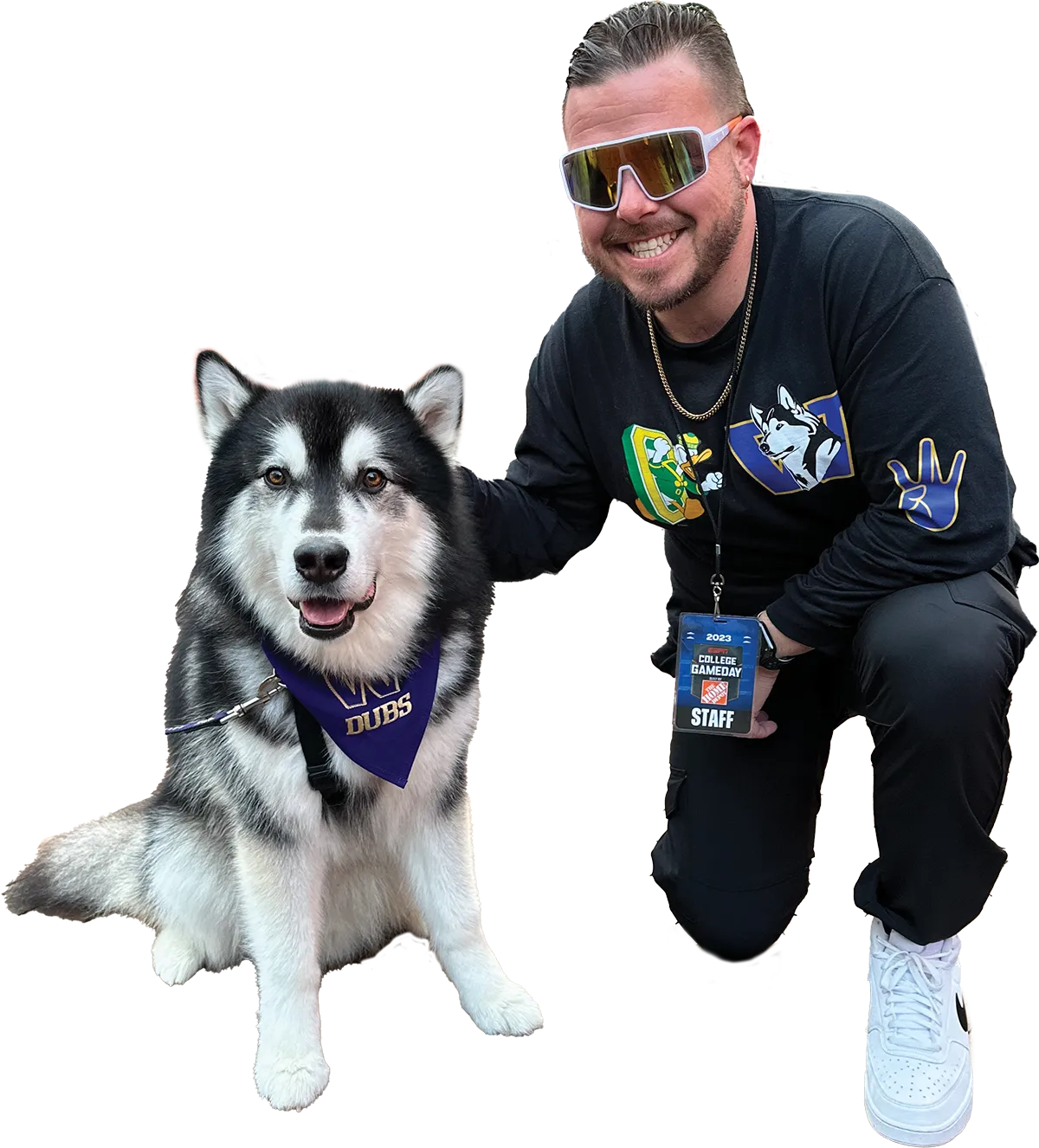 Ryan Griffin posing with Dubs, the University of Washington’s Husky