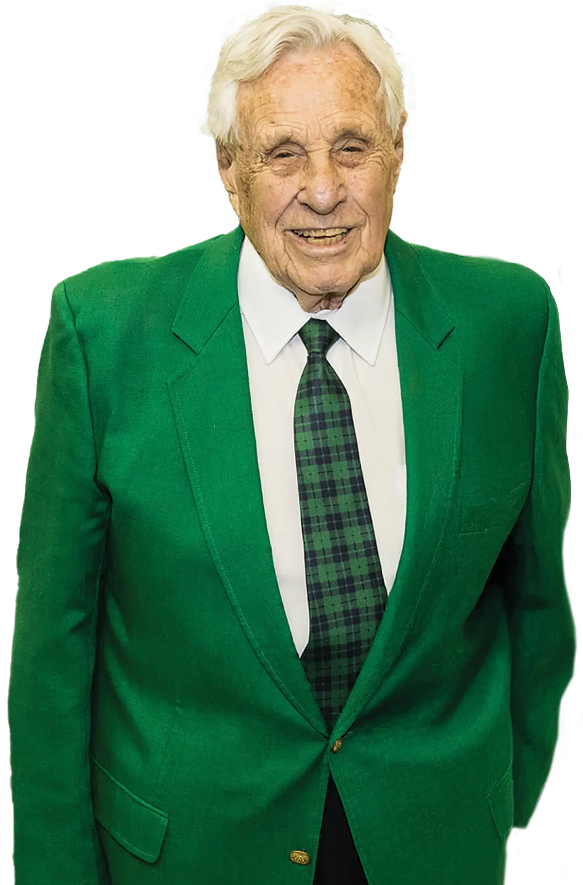 Portrait orientation photograph of Edwin Cottrell, an older, elderly smiling man with white hair, a bright green business blazer suit, a white collared button-up dress shirt, and a dark green plaid tie