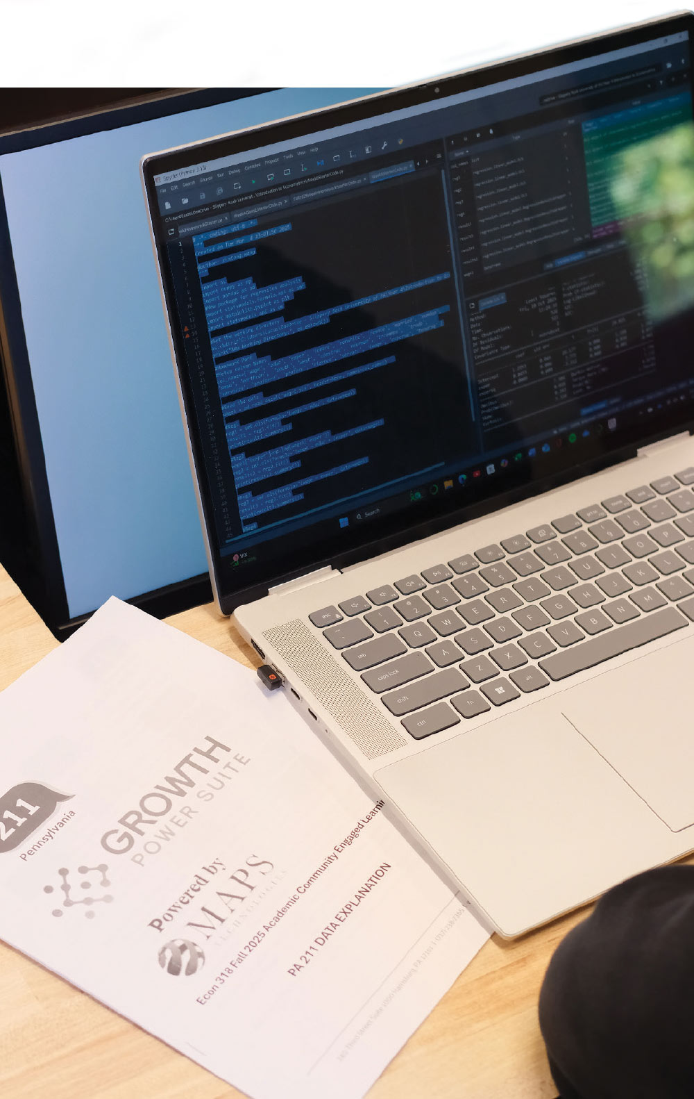 open laptop with the screen displaying code