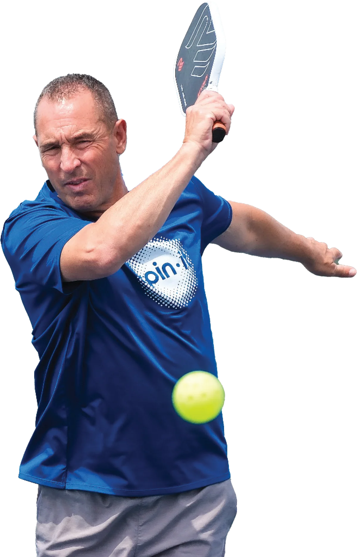 Male athlete hitting a bright yellow pickleball with an overhead forehand shot, showcasing dynamic action on the court.
